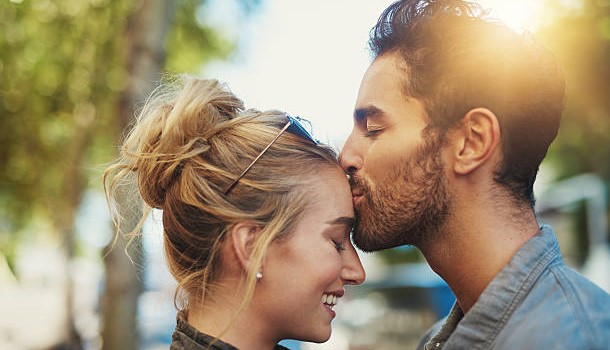 Shot of a young couple out in the city